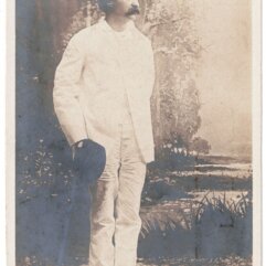 Post Card of Mark Twain in White Suit with Hat and Cane in Hand