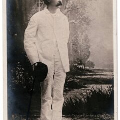 Post Card of Mark Twain in White Suit with Hat and Cane in Hand (Posted)